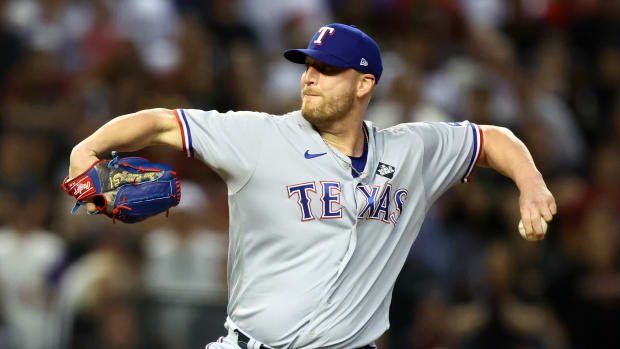 Oct 31, 2023; Phoenix, Arizona, USA; Texas Rangers relief pitcher Will Smith (51) throws a pitch against the Arizona Diamondbacks during the ninth inning in game four of the 2023 World Series at Chase Field. Mandatory Credit: Mark J. Rebilas-USA TODAY Sports  