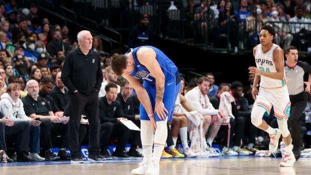 Luka Doncic suffered a left calf strain in the 2021-22 season finale that forced him to miss the first three games of the Dallas Mavericks' first-round series against the Utah Jazz that year.