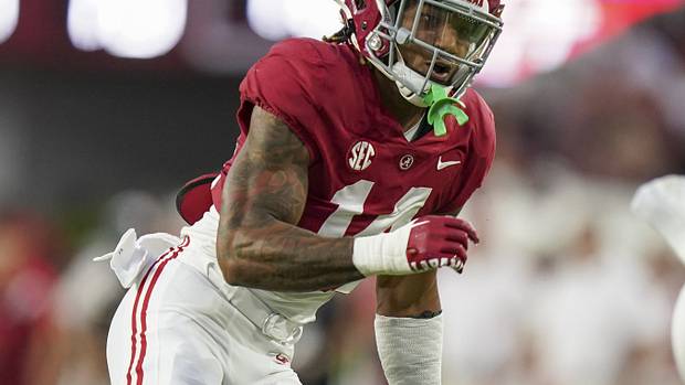 Alabama Crimson Tide defensive back Brian Branch (14) pursues Vanderbilt Commodores running back Ray Davis (2) during the first half at Bryant-Denny Stadium.