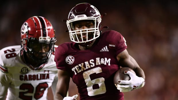 Oct 23, 2021; College Station, Texas, USA; Texas A&M Aggies running back Devon Achane (6) runs the ball in for a touchdown during the third quarter against the South Carolina Gamecocks at Kyle Field. Mandatory Credit: Maria Lysaker-USA TODAY Sports