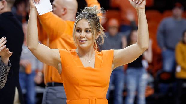Oklahoma State head coach Jacie Hoyt sings the alma mater following the college women's basketball game between the Oklahoma State Cowgirls and the TCU Horned Frogs at Gallagher-Iba Arena in Stillwater, Okla., Saturday, Jan.14, 2023. Osu V Tcu Wbb