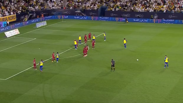 Cristiano Ronaldo pictured (right) standing over a free-kick before scoring his first ever goal at Mrsool Park in Al Nassr's 2-1 win over Abha in March 2023