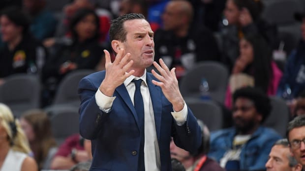 Kenny Atkinson reacts after a foul call.