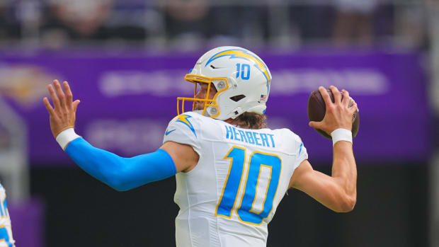 Los Angeles Chargers quarterback Justin Herbert throws a pass against the Minnesota Vikings.