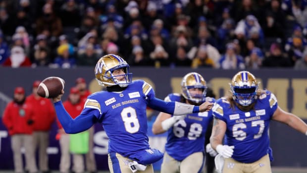 Nov 11, 2023; Winnipeg, Manitoba, CAN; Winnipeg Blue Bombers quarterback Zach Collaros (8) looks downfield for a receiver during the first half of the game against the BC Lions at IG Field. Mandatory Credit: Bruce Fedyck-USA TODAY Sports  