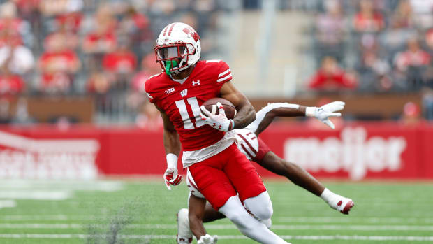 Wisconsin wide receiver Skyler Bell running with the football after a catch versus New Mexico State.