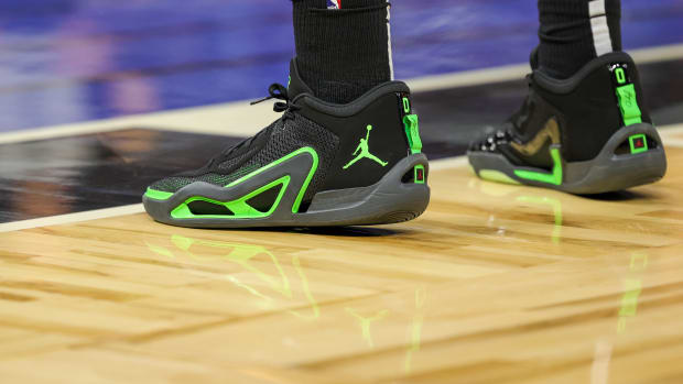Jayson Tatum's black and green Jordan Brand sneakers.