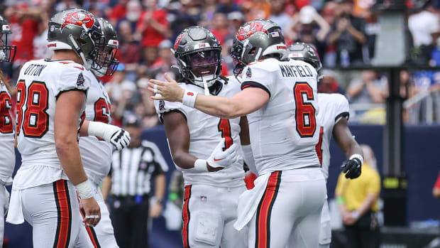 Tampa Bay Buccaneers running back Rachaad White (1) and quarterback Baker Mayfield (6) celebrate after a touchdown during the second quarter against the Houston Texans at NRG Stadium.