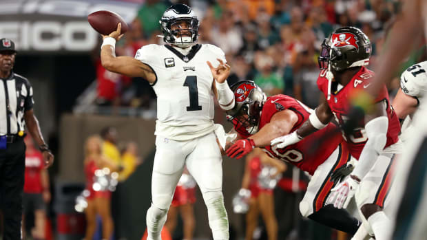 Philadelphia Eagles quarterback Jalen Hurts (1) throws the ball as Tampa Bay Buccaneers defensive tackle Greg Gaines (96) pressures during the first half at Raymond James Stadium. Mandatory Credit: Kim Klement Neitzel-USA TODAY Sports