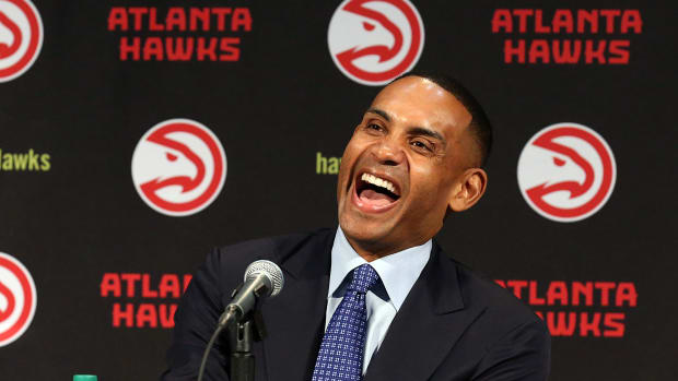 Atlanta Hawks owner Grant Hill speaks during a press conference at Philips Arena. The Atlanta Hawks officially announced today that it was purchased by an ownership group led by Tony Ressler, which Hill is a part of.