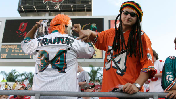 Miami Dolphins fans protest Ricky Williams during a game.
