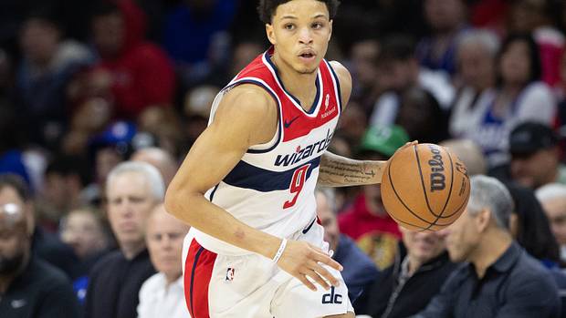 Washington Wizards guard Ryan Rollins (9) dribbles the ball against the Philadelphia 76ers during the fourth quarter at Wells Fargo Center.