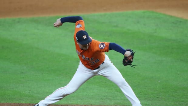 Oct 30, 2019; Houston, TX, USA; Houston Astros pitcher Joe Smith (38) throws a pitch against the Washington Nationals during the ninth inning in game seven of the 2019 World Series at Minute Maid Park.
