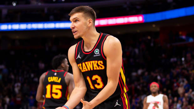 Mar 7, 2022; Detroit, Michigan, USA; Atlanta Hawks guard Bogdan Bogdanovic (13) reacts after getting called for a foul during the fourth quarter against the Detroit Pistons at Little Caesars Arena.