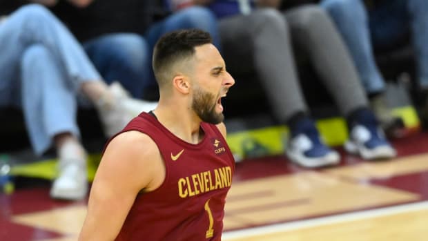 Feb 27, 2024; Cleveland, Ohio, USA; Cleveland Cavaliers guard Max Strus (1) celebrates a three-point basket in the fourth quarter against the Dallas Mavericks at Rocket Mortgage FieldHouse. Mandatory Credit: David Richard-USA TODAY Sports