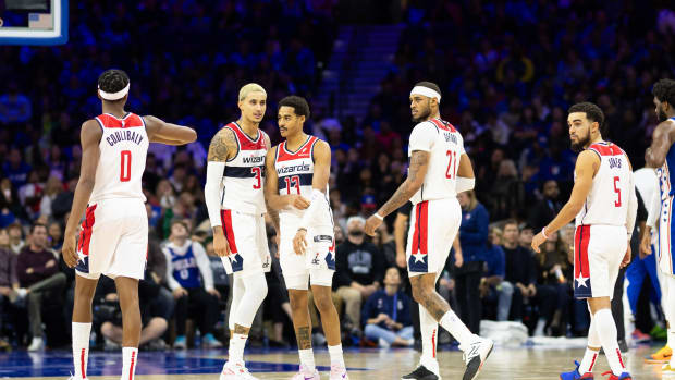 Washington Wizards Kyle Kuzma (33) and Bilal Coulibaly (0) and Jordan Poole (13) and Daniel Gafford (21) and Tyus Jones (5) during the third quarter against the Philadelphia 76ers at Wells Fargo Center. 