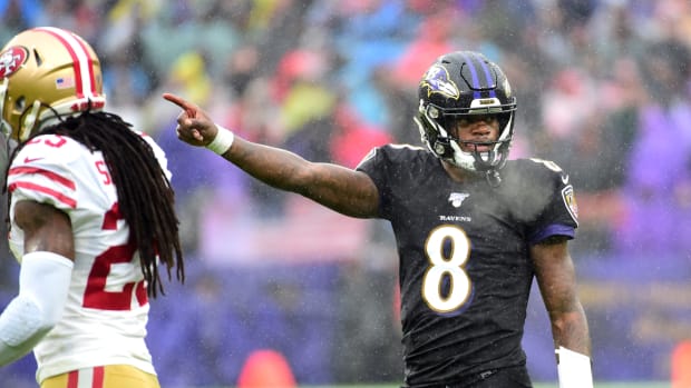 Dec 1, 2019; Baltimore, MD, USA; Baltimore Ravens quarterback Lamar Jackson (8) indicates a first down in the second quarter against the San Francisco 49ers at M&T Bank Stadium. Mandatory Credit: Evan Habeeb-USA TODAY Sports  