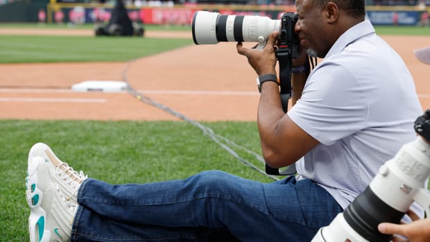 Ken Griffey Jr. takes pictures during the 2023 All-Star Home Run Derby.