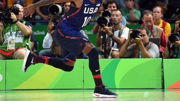 USA guard Kyrie Irving grabs a loose ball during the 2016 Summer Olympic Games.