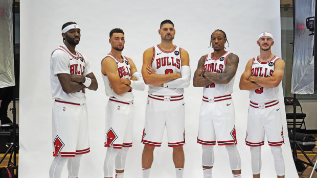 Chicago Bulls forward Patrick Williams (44), guard Zach LaVine (8), center Nikola Vucevic (9), forward DeMar DeRozan (11),