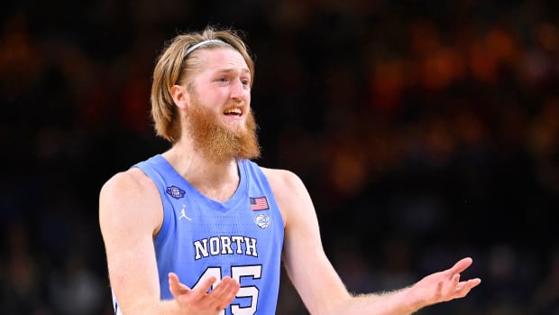 North Carolina Tar Heels forward Brady Manek (45) reacts after a play against the Kansas Jayhawks during the first half during the 2022 NCAA men's basketball tournament Final Four championship game at Caesars Superdome.