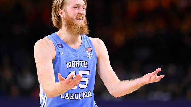 North Carolina Tar Heels forward Brady Manek (45) reacts after a play against the Kansas Jayhawks during the first half during the 2022 NCAA men's basketball tournament Final Four championship game at Caesars Superdome.