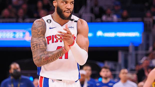Pistons forward Saddiq Bey celebrates a shot.