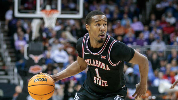 Mar 9, 2023; Kansas City, MO, USA; Oklahoma State Cowboys guard Bryce Thompson (1) brings the ball up court during the second half against the Texas Longhorns at T-Mobile Center. Mandatory Credit: William Purnell-USA TODAY Sports
