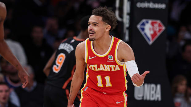 Mar 22, 2022; New York, New York, USA; Atlanta Hawks guard Trae Young (11) reacts after a basket against the New York Knicks during the second half at Madison Square Garden.