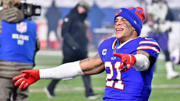 Bills free safety Jordan Poyer (21) celebrates a win over the Baltimore Ravens in their AFC Divisional Round playoff game at Bills Stadium.