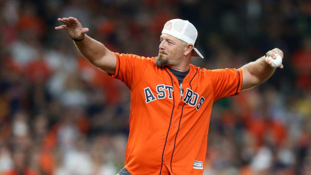 Oct 5, 2019; Houston, TX, USA; Former Astros' Billy Wagner throws out the first pitch prior to the game between the Tampa Bay Rays and the Houston Astros in game two of the 2019 ALDS playoff baseball series at Minute Maid Park. Mandatory Credit: Thomas B. Shea-USA TODAY Sports  