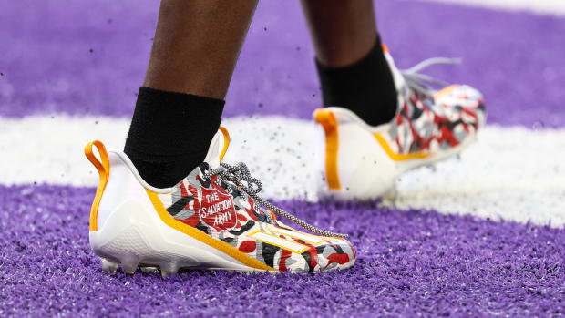 View of red and white cleats.