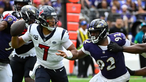 Texans quarterback C.J. Stroud attempts a pass as Baltimore Ravens defensive tackle Rayshad Nichols rushes during the second half at M&T Bank Stadium.