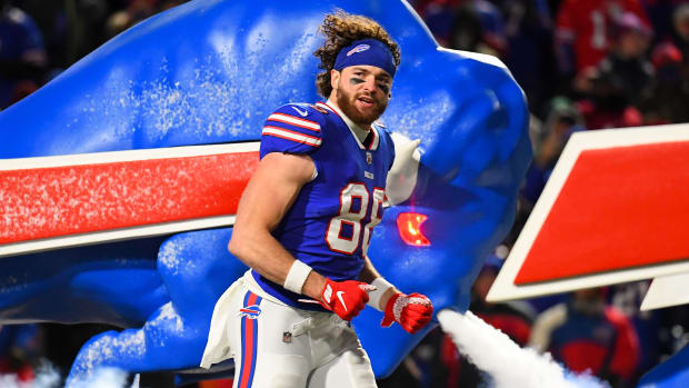 Buffalo Bills tight end Dawson Knox (88) jogs on the field during player introductions prior to the game against the New England Patriots at Highmark Stadium.
