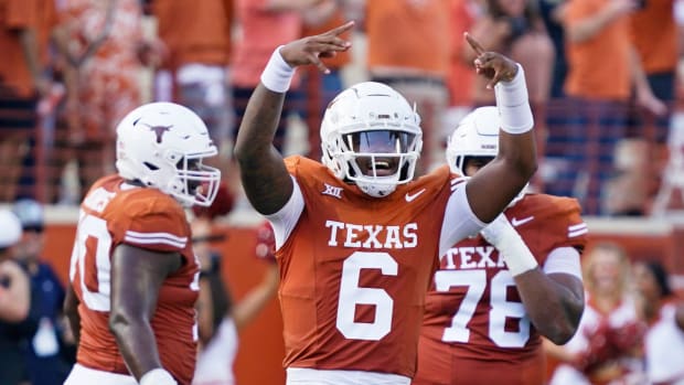 Texas Longhorns quarterback Maalik Murphy (6) reacts after throwing a touchdown pass during the first half against the Brigham Young Cougars at Darrell K Royal-Texas Memorial Stadium. 