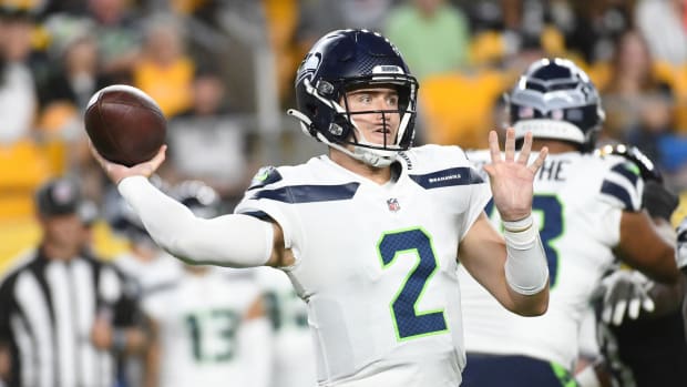 Seattle Seahawks quarterback Drew Lock (2) throws a pass against the Pittsburgh Steelers during the third quarter at Acrisure Stadium.