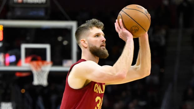 Nov 19, 2023; Cleveland, Ohio, USA; Cleveland Cavaliers forward Dean Wade (32) shoots in the fourth quarter against the Denver Nuggets at Rocket Mortgage FieldHouse.