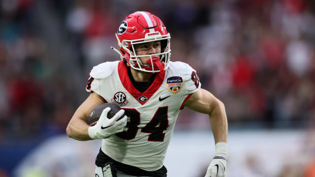 Dec 30, 2023; Miami Gardens, FL, USA; Georgia Bulldogs wide receiver Ladd McConkey (84) makes a catch and runs for touchdown against the Florida State Seminoles during the first half in the 2023 Orange Bowl at Hard Rock Stadium. Mandatory Credit: Sam Navarro-USA TODAY Sports  