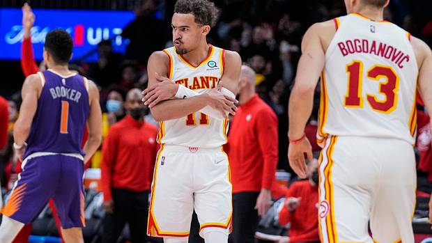 Trae Young celebrates after a made shot.