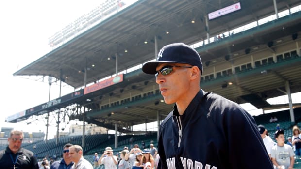 June 17, 2011; Chicago, IL, USA; New York Yankees manager Joe Girardi takes the field before the game against the Chicago Cubs at Wrigley Field. Mandatory Credit: Jerry Lai-USA TODAY Sports