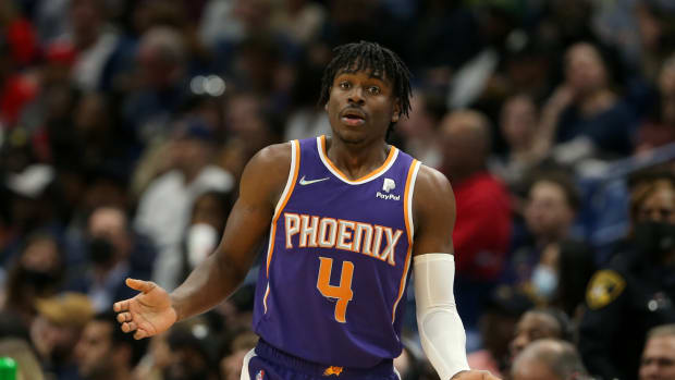Phoenix Suns guard Aaron Holiday (4) gestures after being called for a foul in the second half against the New Orleans Pelicans at the Smoothie King Center.
