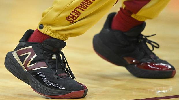 Cleveland Cavaliers guard Darius Garland's black and gold New Balance sneakers.