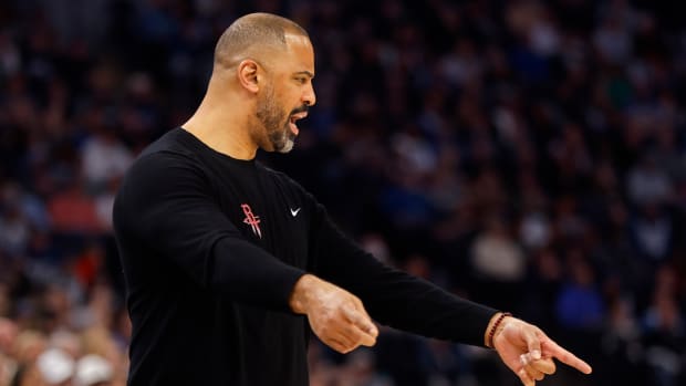 Rockets head coach Ime Udoka questions a referee as his team plays the Minnesota Timberwolves in the first quarter at Target Center.