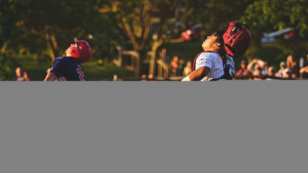 Tommy Courtney of the Harwich Mariners and Chatham Anglers catcher Dominic Tamez