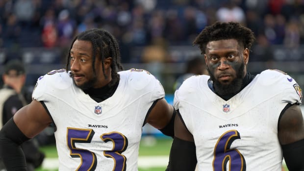 Baltimore Ravens linebacker Del'Shawn Phillips (53) and Baltimore Ravens linebacker Patrick Queen (6) seen after an NFL International Series game at Tottenham Hotspur Stadium.