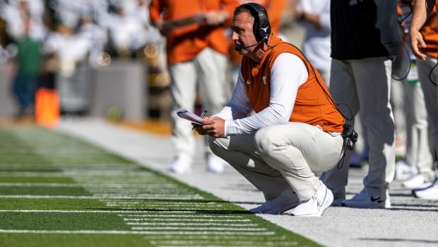 Texas Longhorns head coach Steve Sarkisian watches as his team competes against Baylor Bears in the first half of an NCAA football game at McLane Stadium.