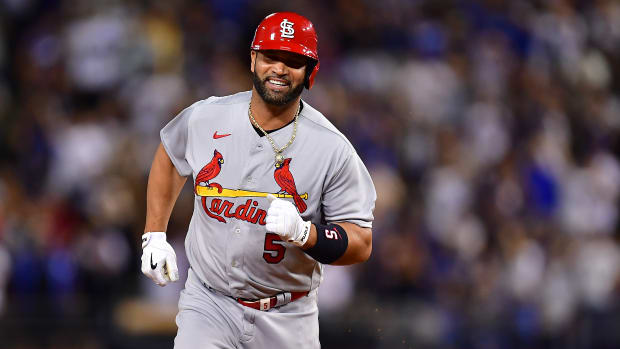 Sep 23, 2022; Los Angeles, California, USA; St. Louis Cardinals designated hitter Albert Pujols (5) rounds the bases after hitting a three run home run and the 700th of his career against the Los Angeles Dodgers during the fourth inning at Dodger Stadium. Mandatory Credit: Gary A. Vasquez-USA TODAY Sports