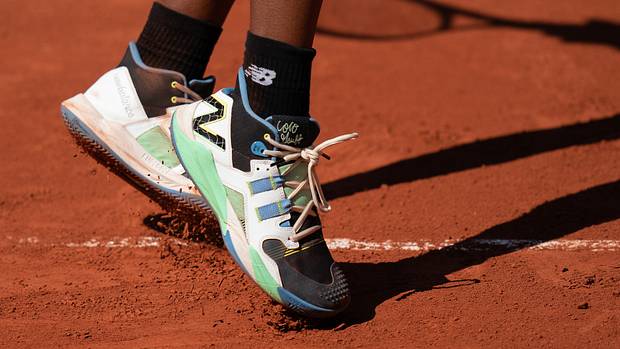 View of Coco Gauff's black and green New Balance shoes at the French Open.
