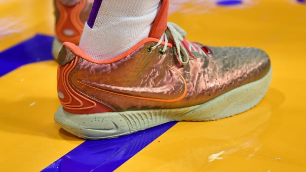 Los Angeles Lakers forward LeBron James's red and gold Nike sneakers.