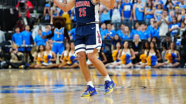 Arizona Wildcats guard Kerr Kriisa celebrates after scoring.